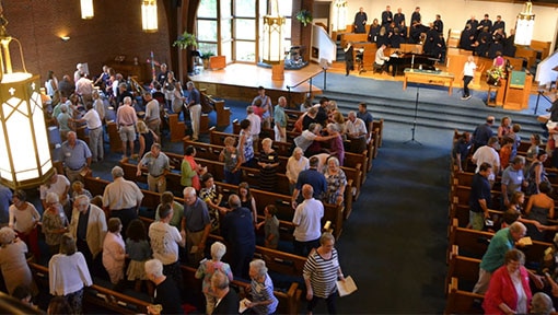 Gathering of people inside of a church