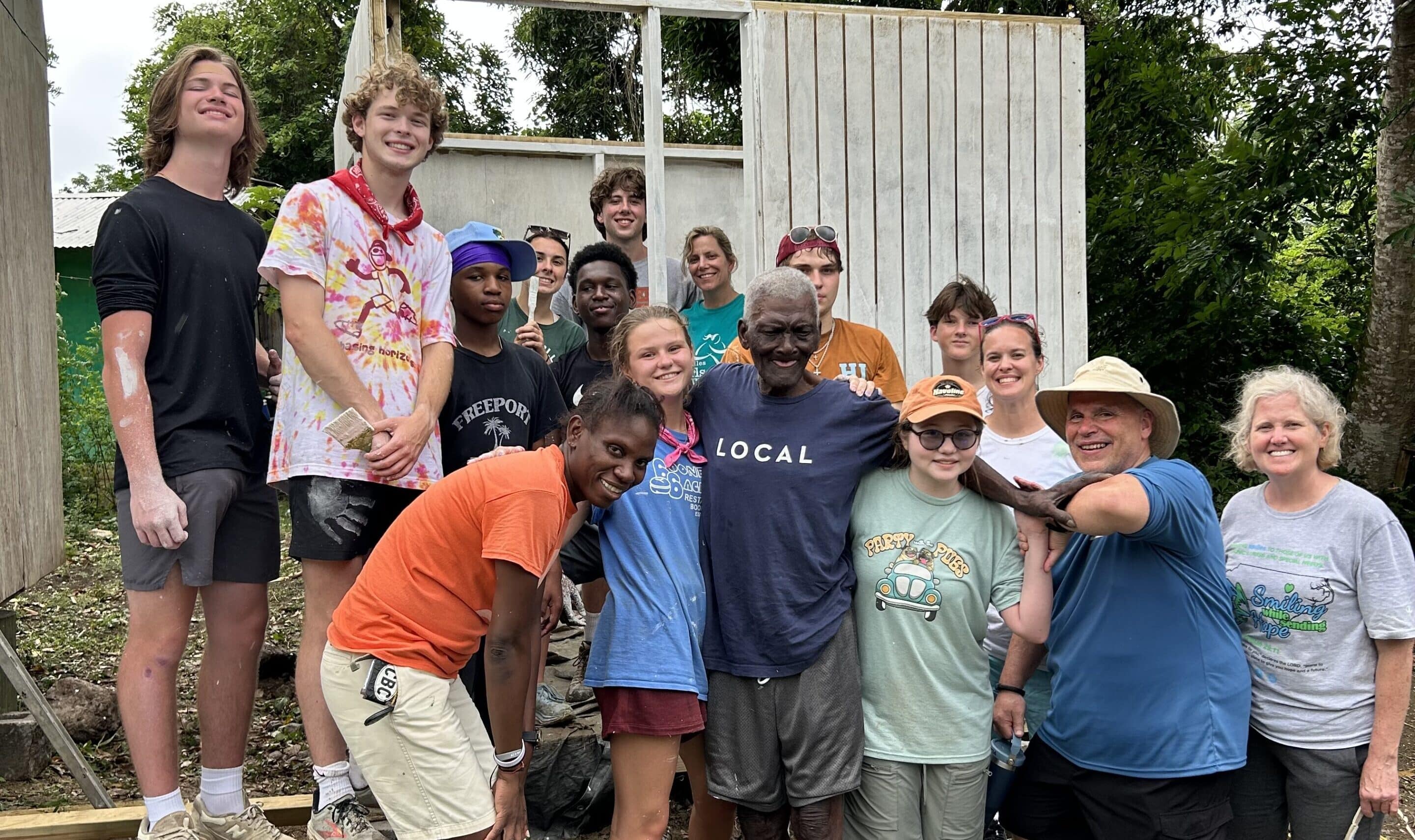 Wooden sign by roadside for Pine Ridge park